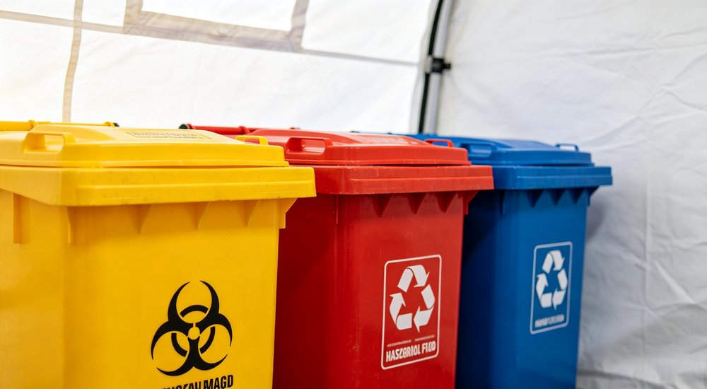 Medical waste disposal inside inflatable tent, biohazard bag and waste container red and white inflatable emergency shelter for disaster relief operations
